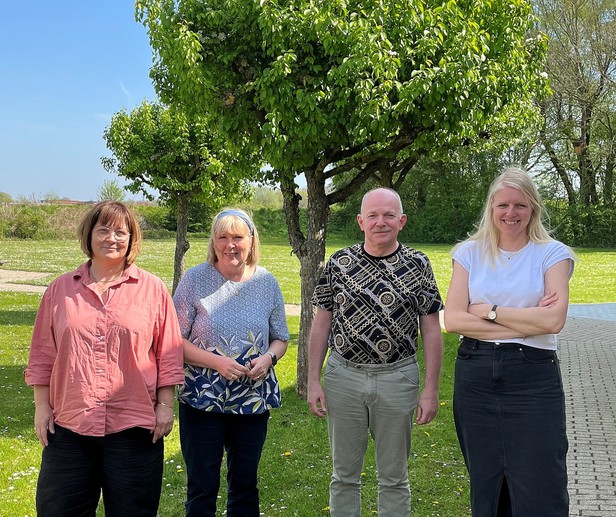 Billede af Janne, Lene, Michael og Mie foran MedCom